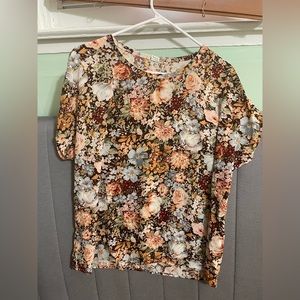 Light flowery shirt, neutral tones